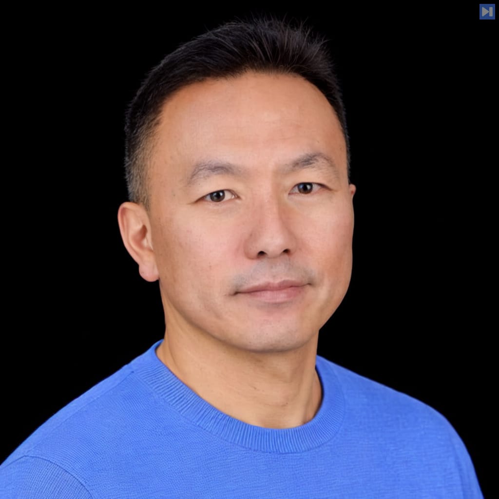 Head-and-shoulders portrait of Michael Yang against a black background.