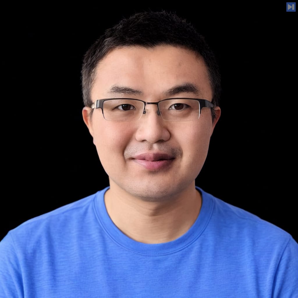 Head-and-shoulders portrait of Ming-Yu Liu against a black background.