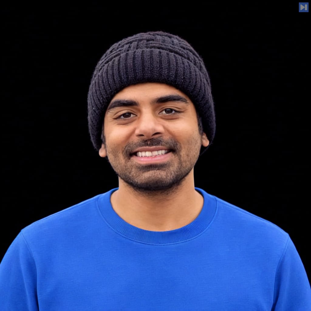Head-and-shoulders portrait of Naman Ahuja against a black background.