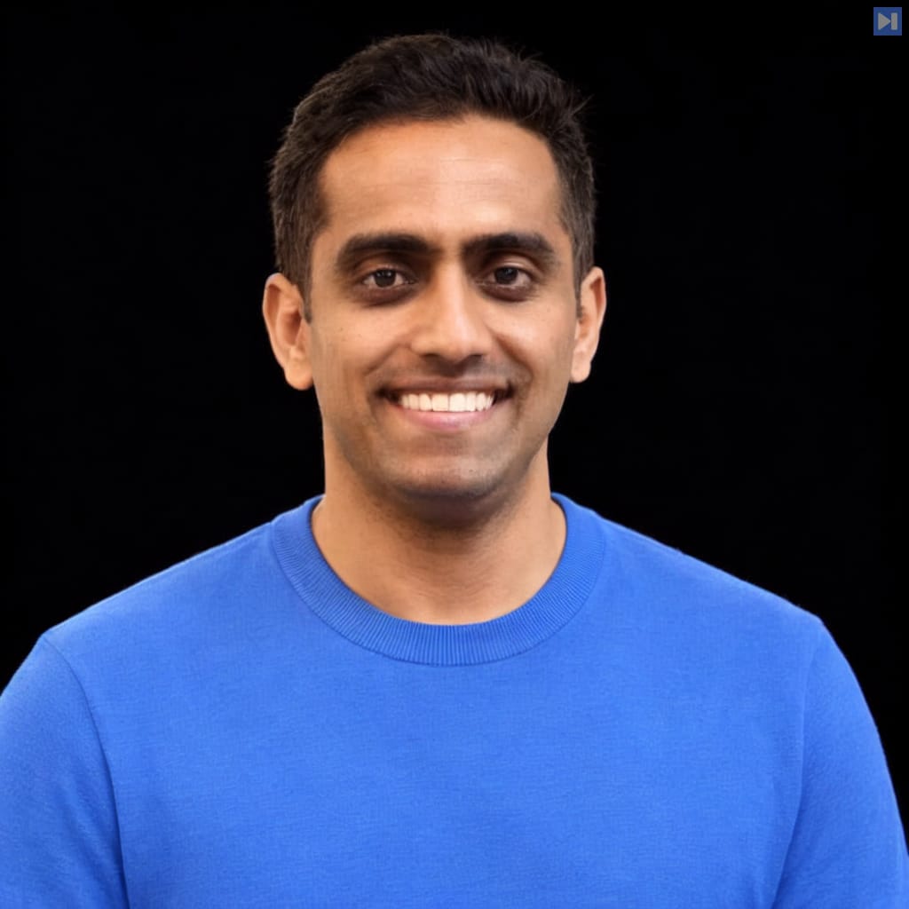 Head-and-shoulders portrait of Navinkumar Patil against a black background.