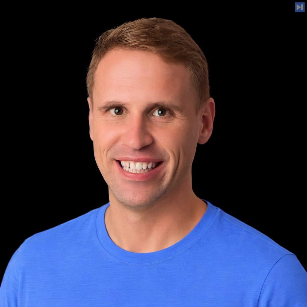 Head-and-shoulders portrait of Nich Tremper against a black background.