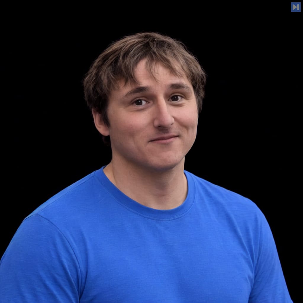 Head-and-shoulders portrait of Nick Cammarata against a black background.