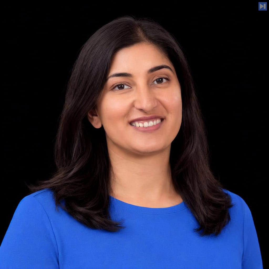 Head-and-shoulders portrait of Nilofer Rajpurkar against a black background.