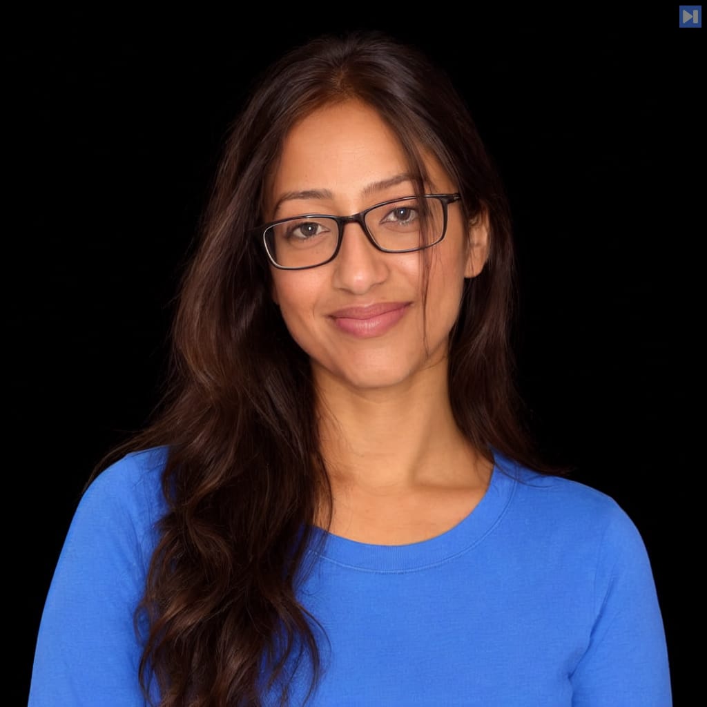 Head-and-shoulders portrait of Palak Agarwal against a black background.