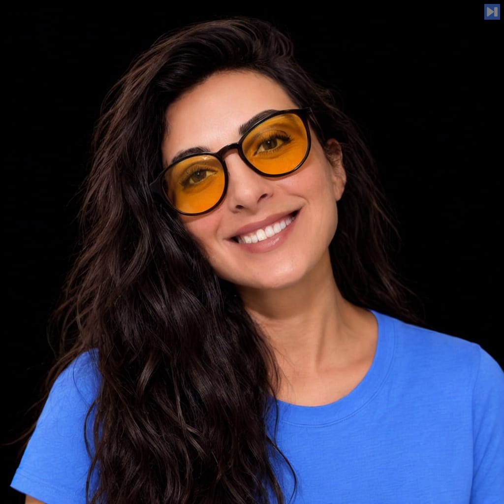 Head-and-shoulders portrait of Paola Estefania against a black background.