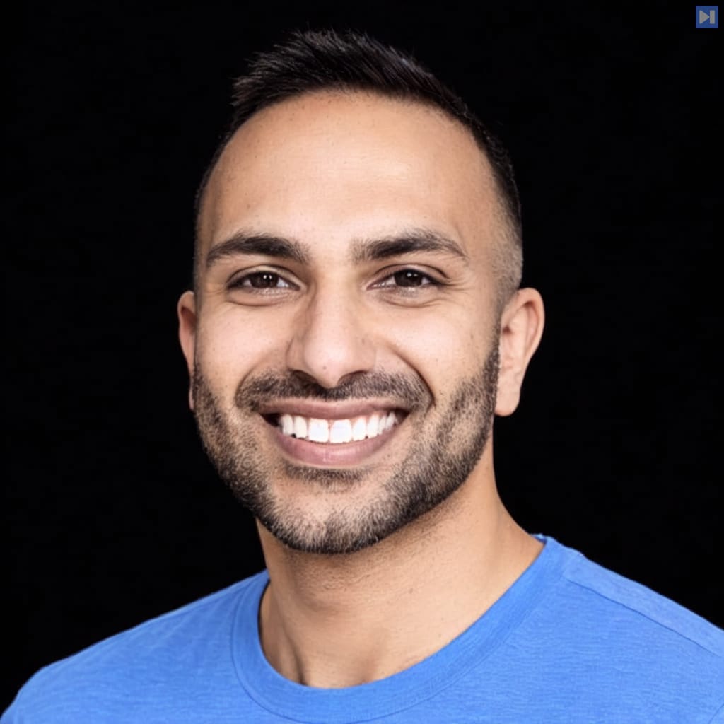 Head-and-shoulders portrait of Rajiv Chandegra against a black background.