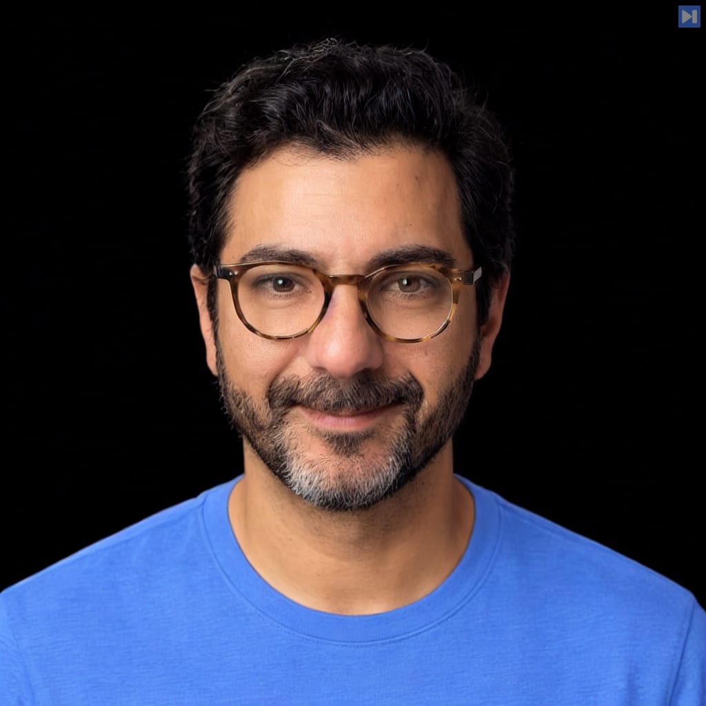 Head-and-shoulders portrait of Rami Banna against a black background.