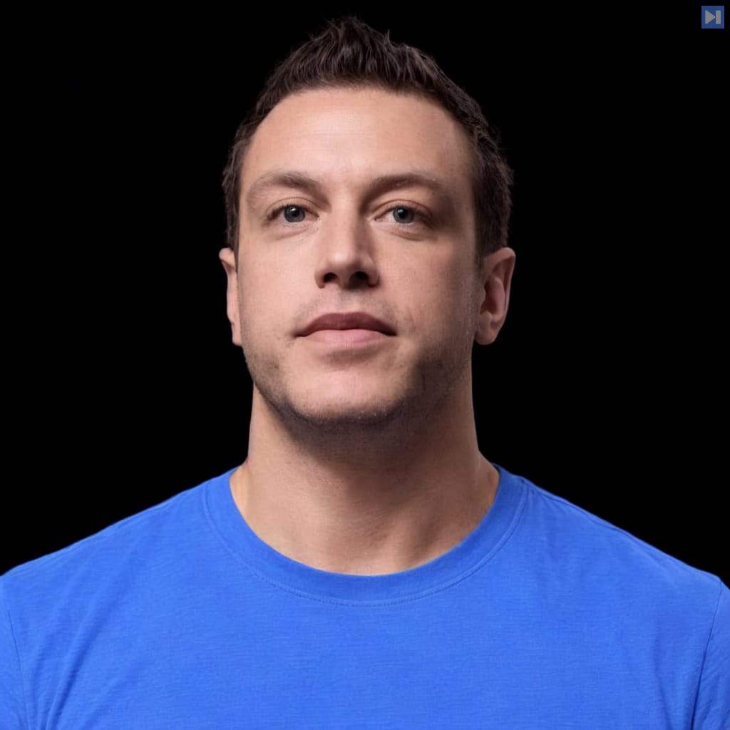 Head-and-shoulders portrait of Randall Degges against a black background.