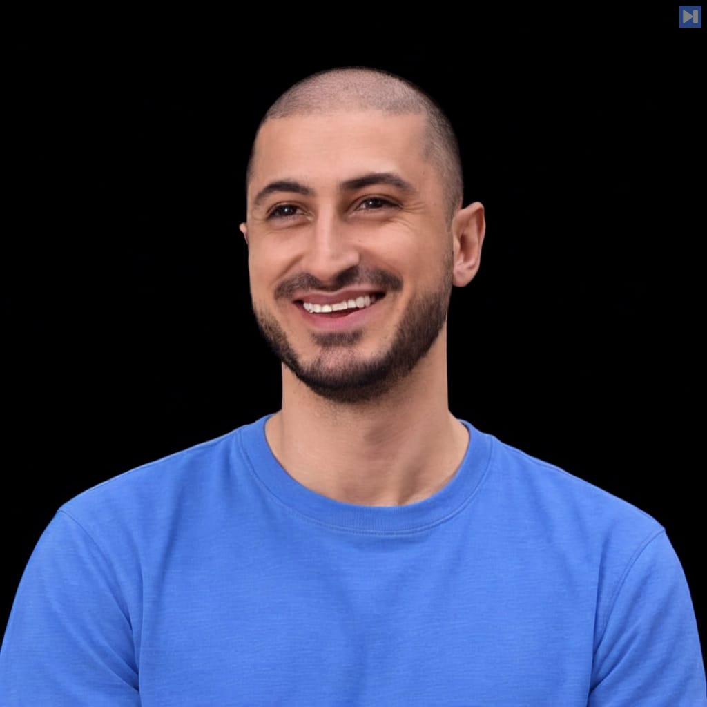Head-and-shoulders portrait of Raphael Kalandadze against a black background.
