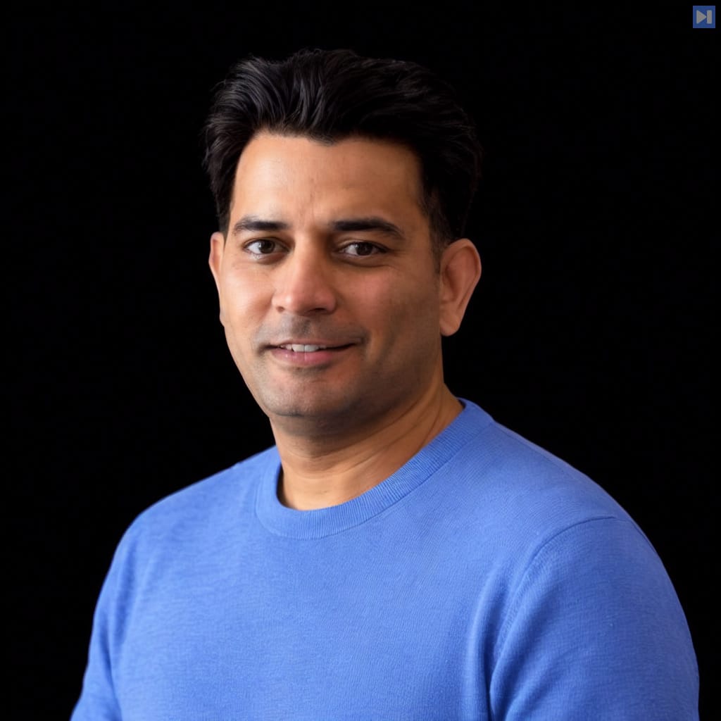 Head-and-shoulders portrait of Ritvik Pandya against a black background.