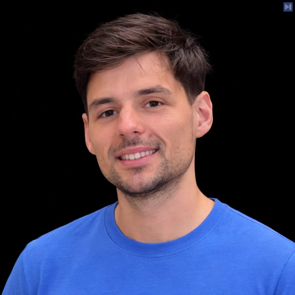 Head-and-shoulders portrait of Roland Gavrilescu against a black background.