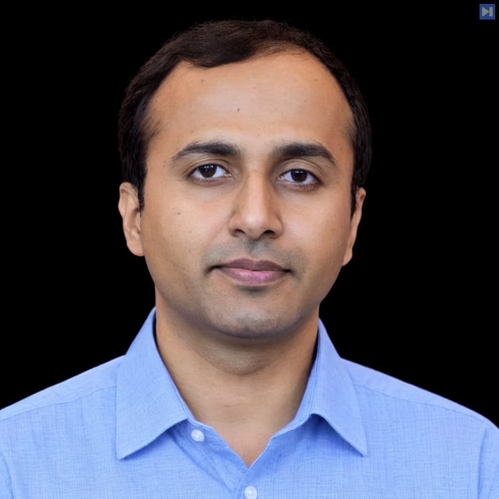 Head-and-shoulders portrait of Sachin Kumar against a black background.