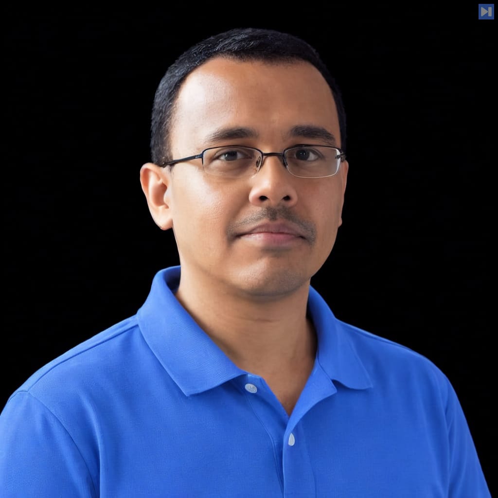 Head-and-shoulders portrait of Sajjan Kanukolanu against a black background.