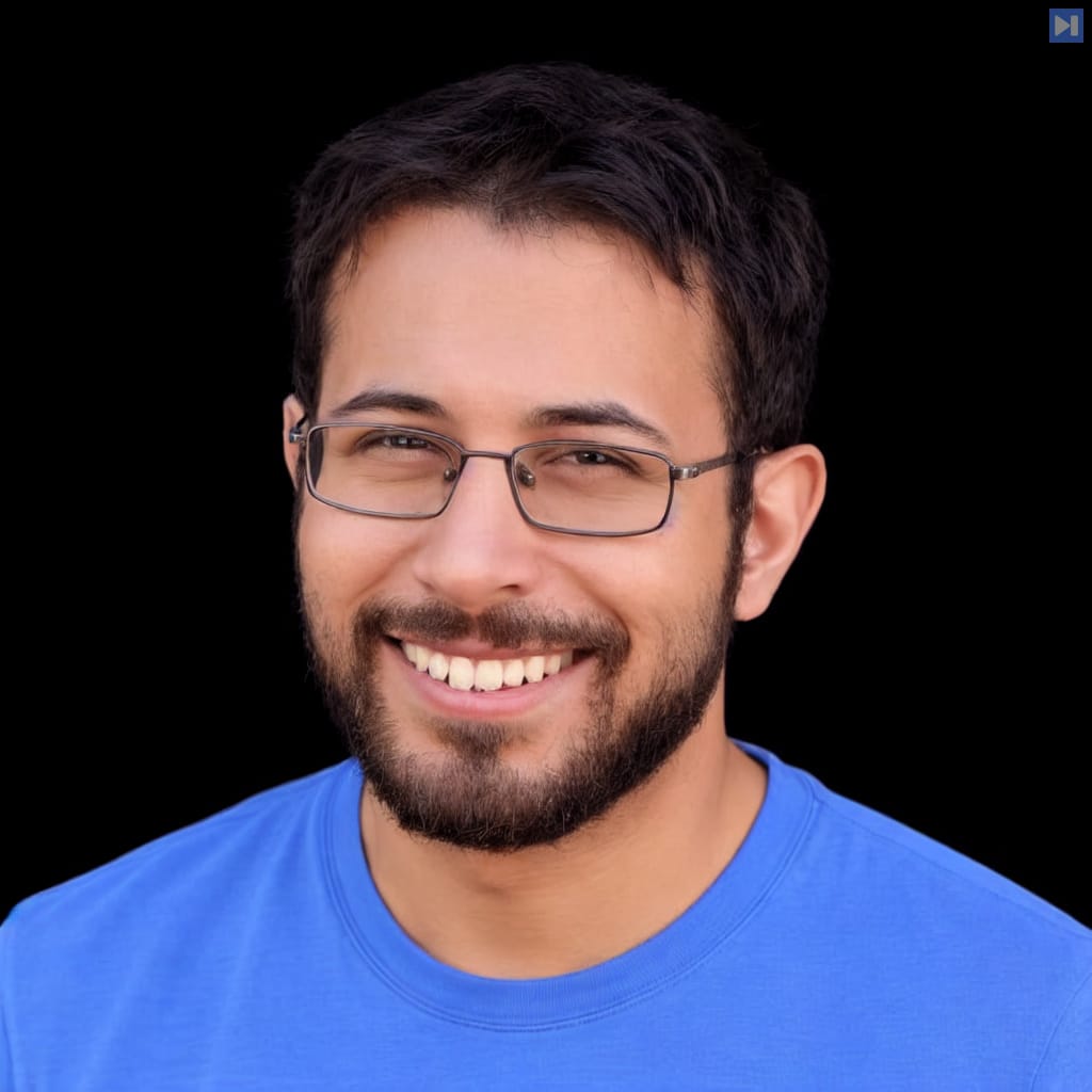 Head-and-shoulders portrait of Sam Bhagwat against a black background.