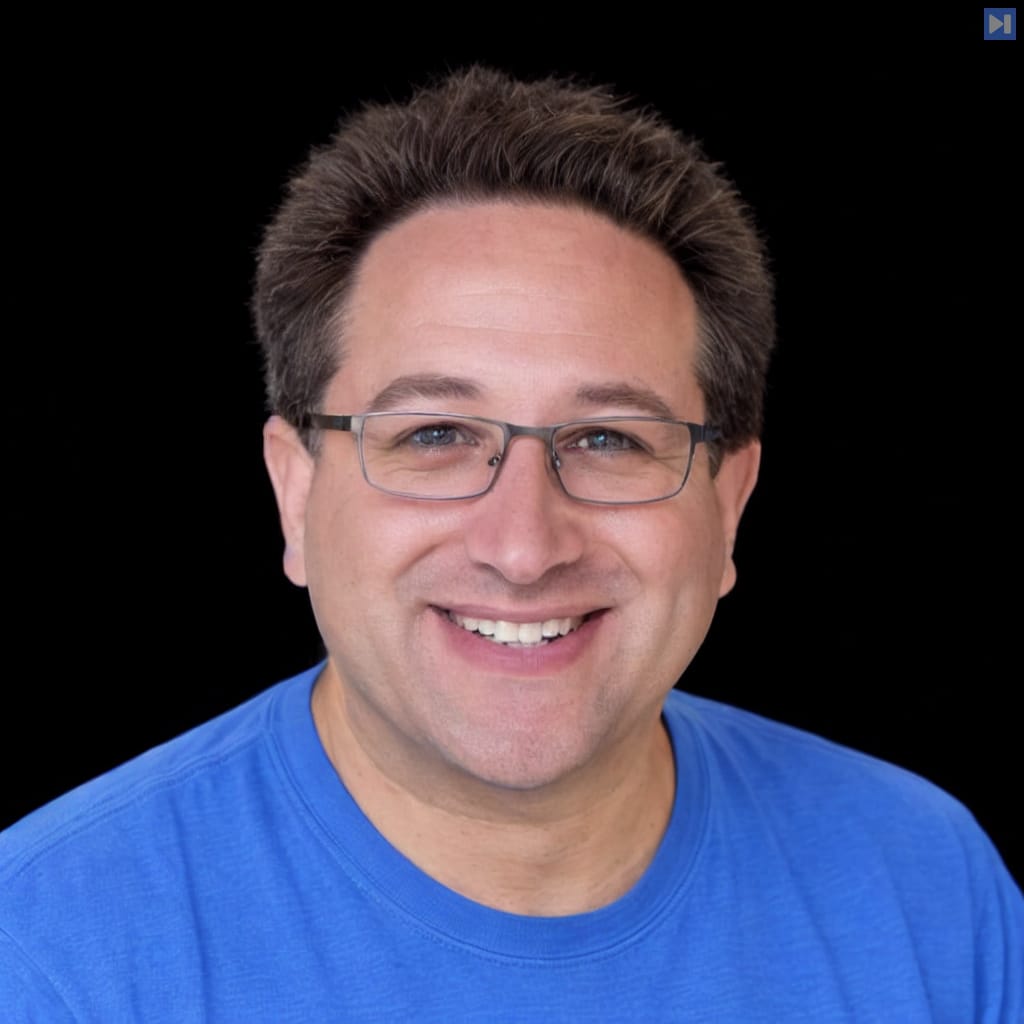 Head-and-shoulders portrait of Scott Aaronson against a black background.