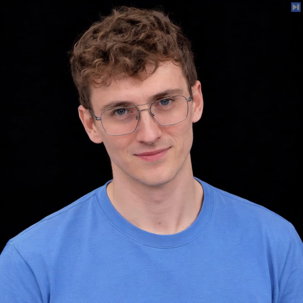 Head-and-shoulders portrait of Sean Cheetham against a black background.