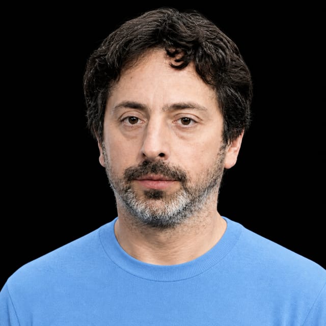 AI-generated portrait of Sergey Brin wearing an AI Videos-blue top against a black background.