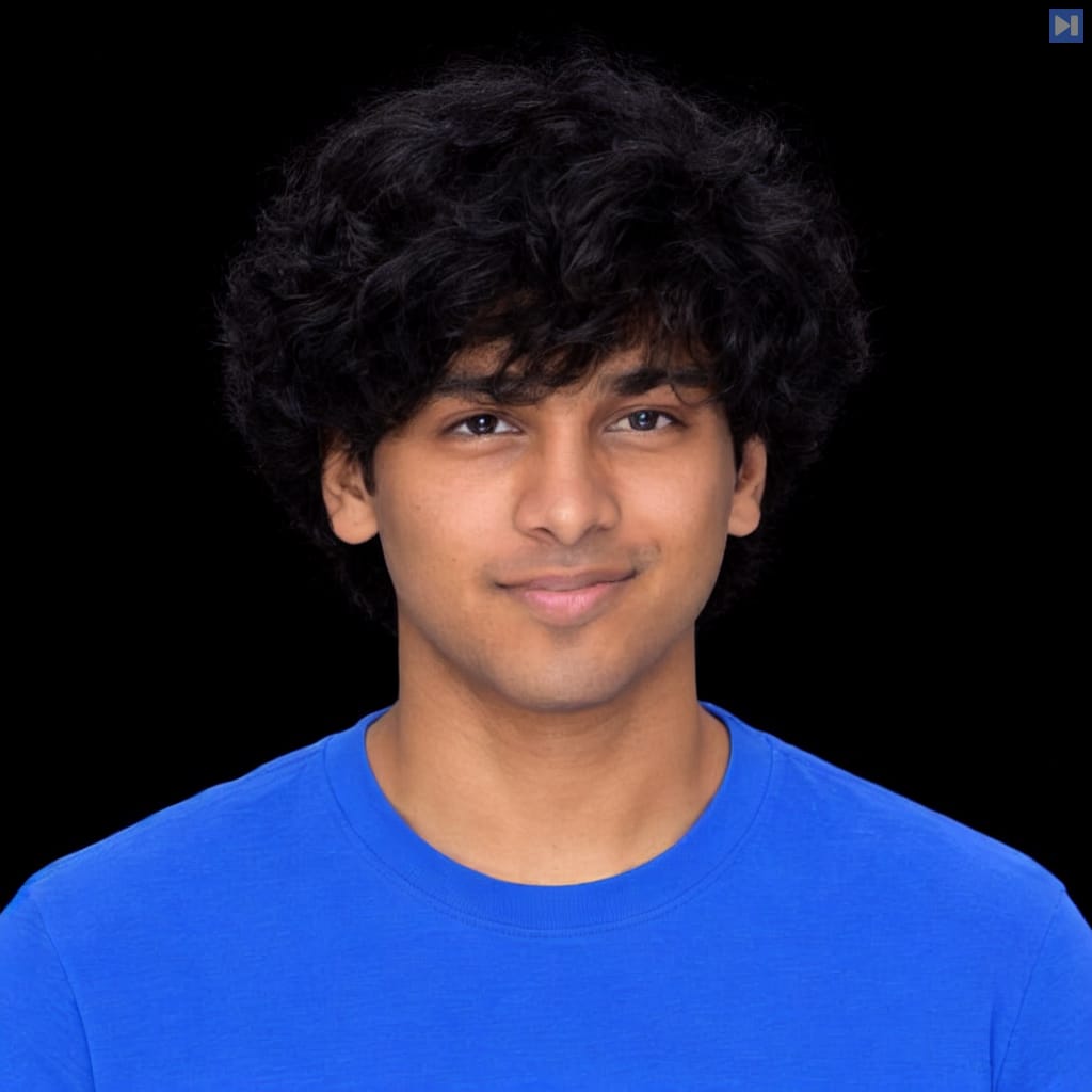 Head-and-shoulders portrait of Sid Patllollu against a black background.