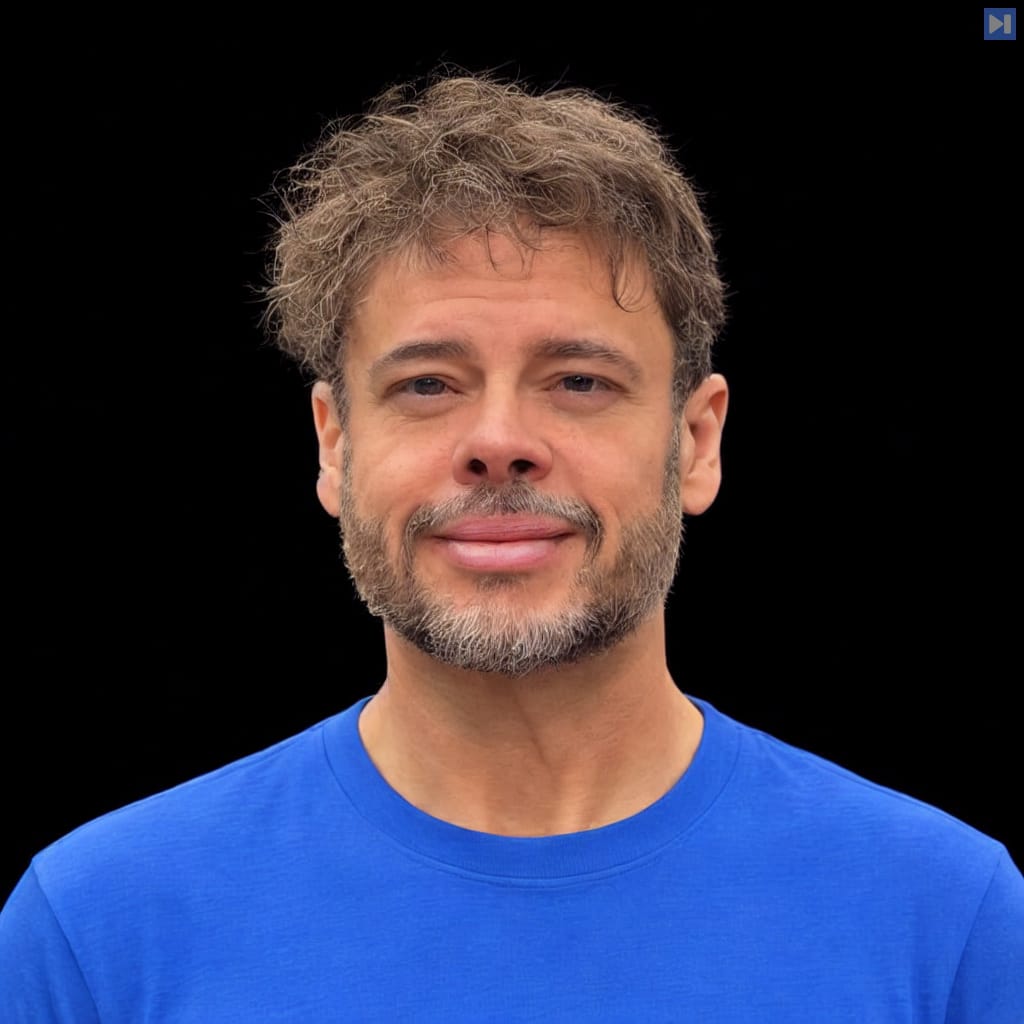 Head-and-shoulders portrait of Steve Yegge against a black background.
