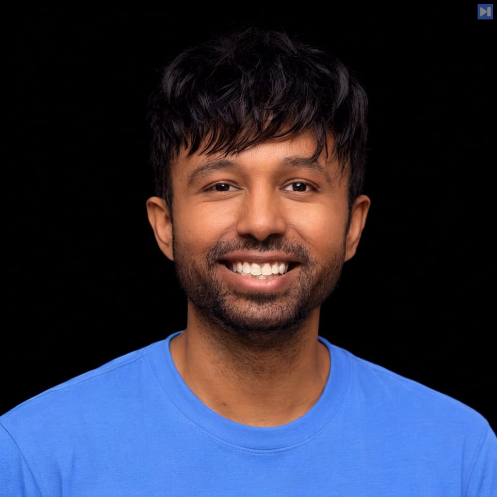 Head-and-shoulders portrait of Sumanyu Sharma against a black background.