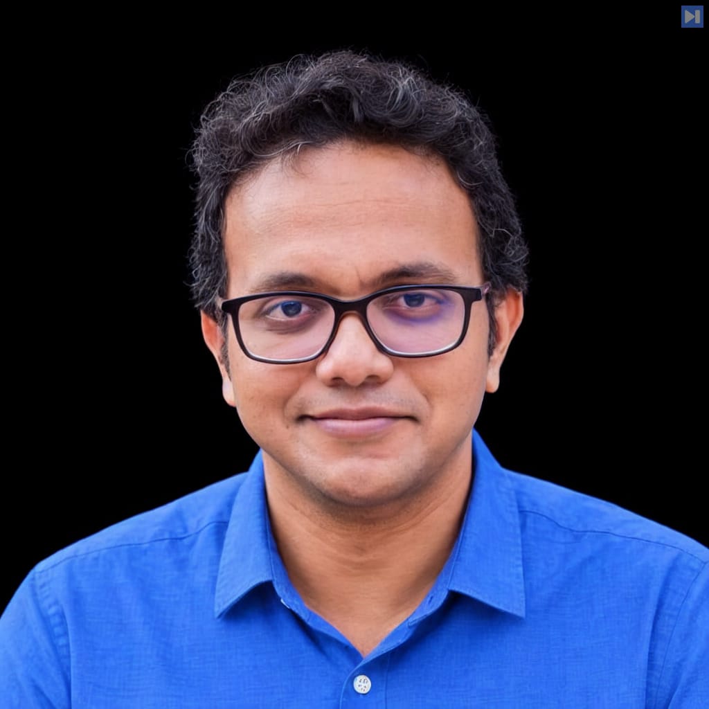 Head-and-shoulders portrait of Thiyagarajan Maruthavanan against a black background.