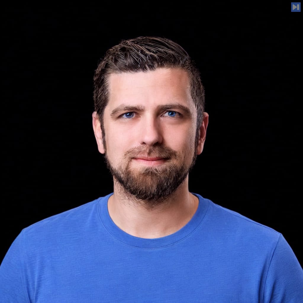 Head-and-shoulders portrait of Thorsten Hans against a black background.