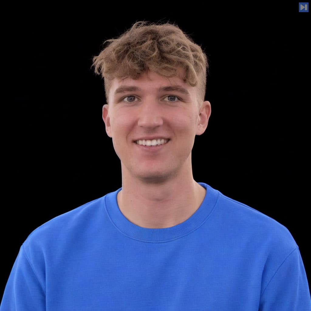 Head-and-shoulders portrait of Tobias Gessler against a black background.
