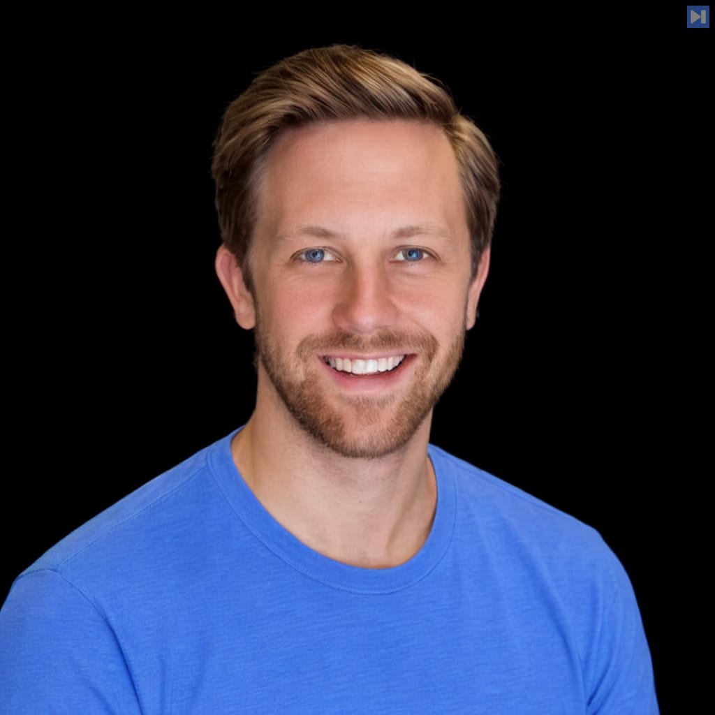 Head-and-shoulders portrait of Tom Blomfield against a black background.