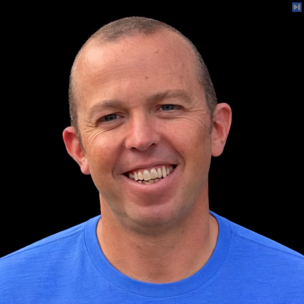 Head-and-shoulders portrait of Tony Padilla against a black background.