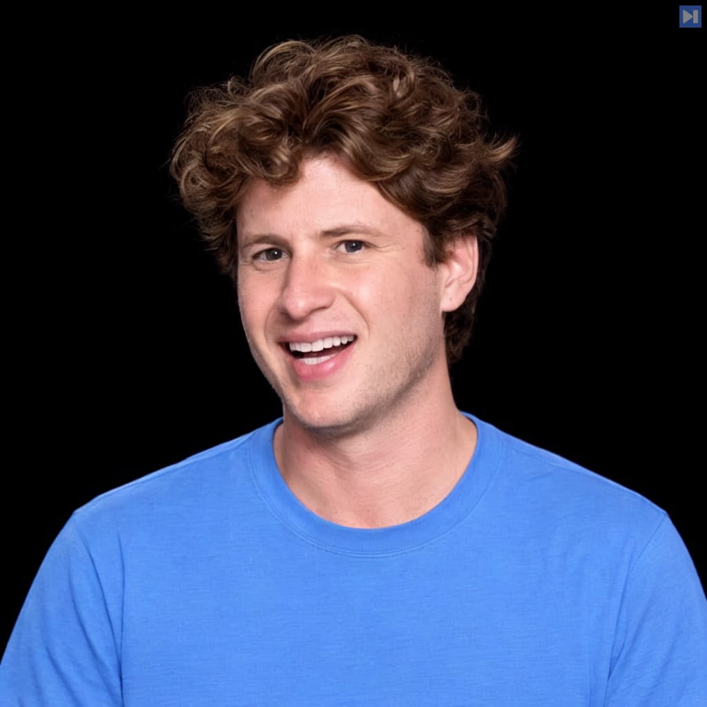 Head-and-shoulders portrait of Uri Rolls against a black background.