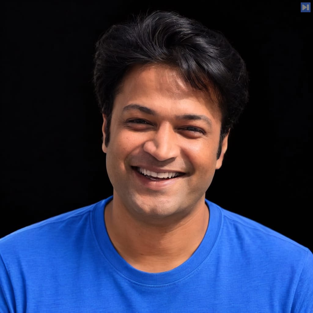 Head-and-shoulders portrait of Varun Krovvidi against a black background.