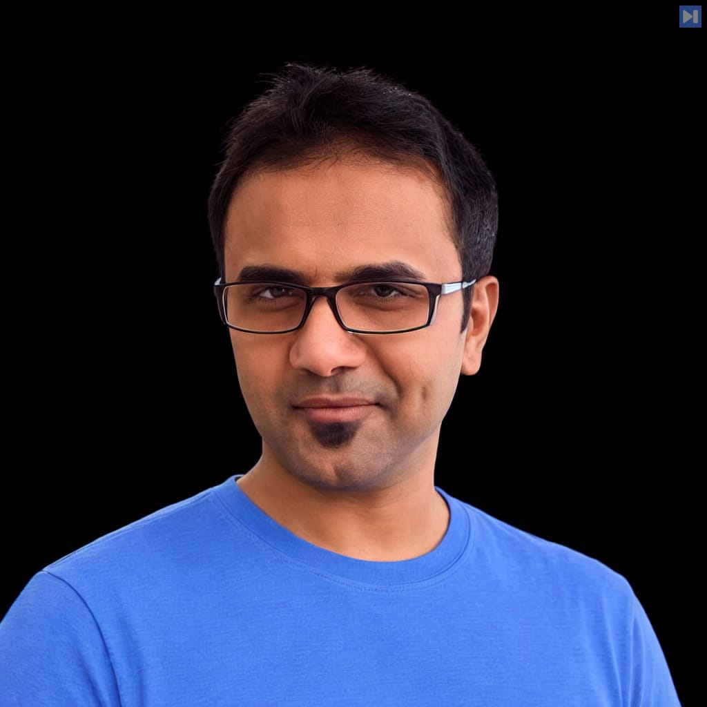 Head-and-shoulders portrait of Venky Balasubramanian against a black background.