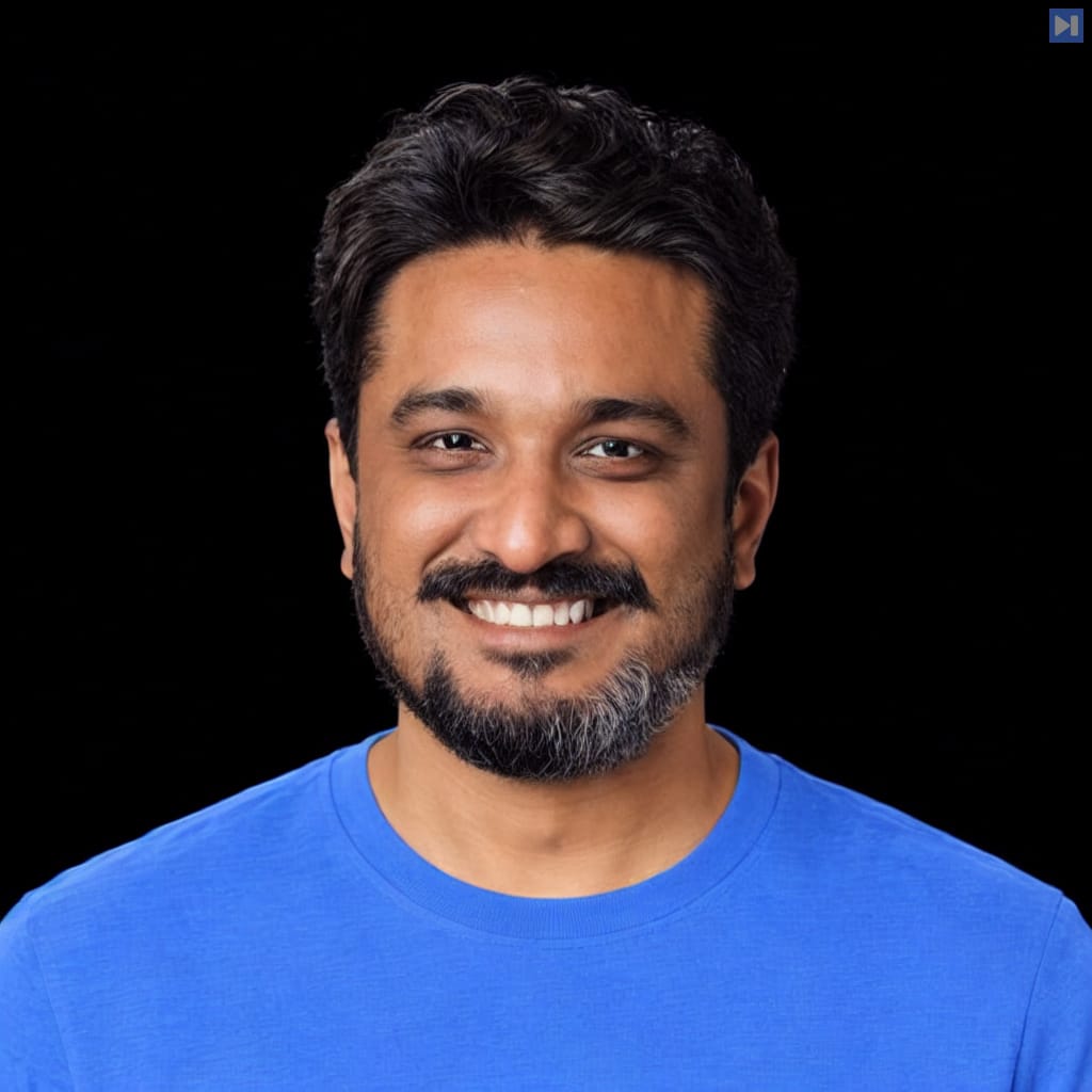 Head-and-shoulders portrait of Vinay Seshadri against a black background.