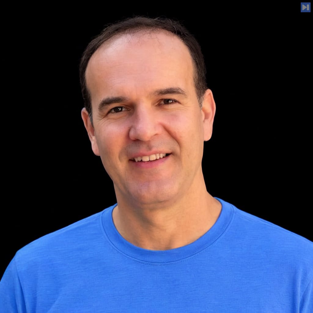 Head-and-shoulders portrait of Vlad Luzin against a black background.