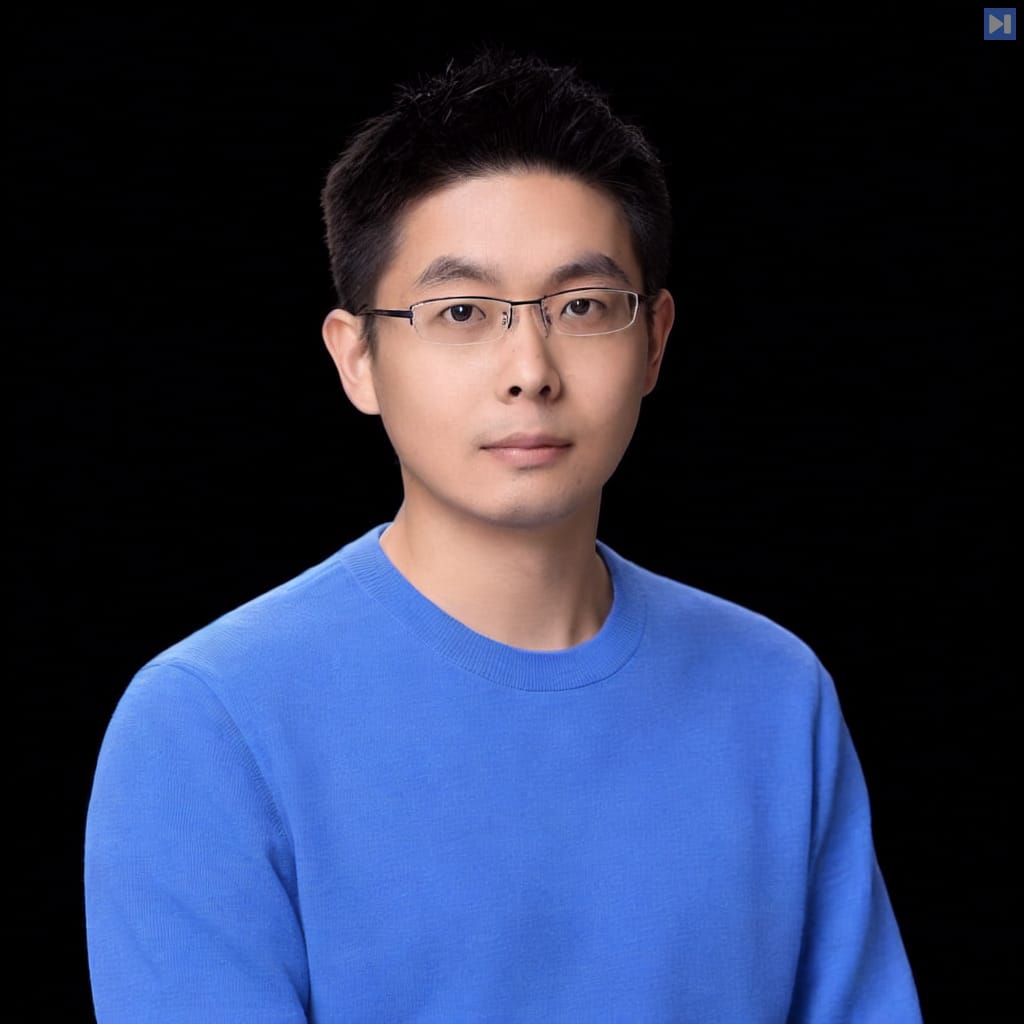 Head-and-shoulders portrait of Wang Xingxing against a black background.