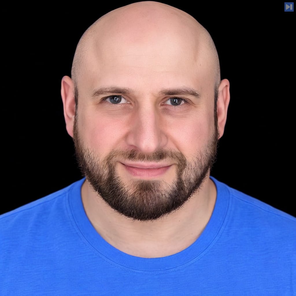 Head-and-shoulders portrait of Wolfram Ravenwolf against a black background.