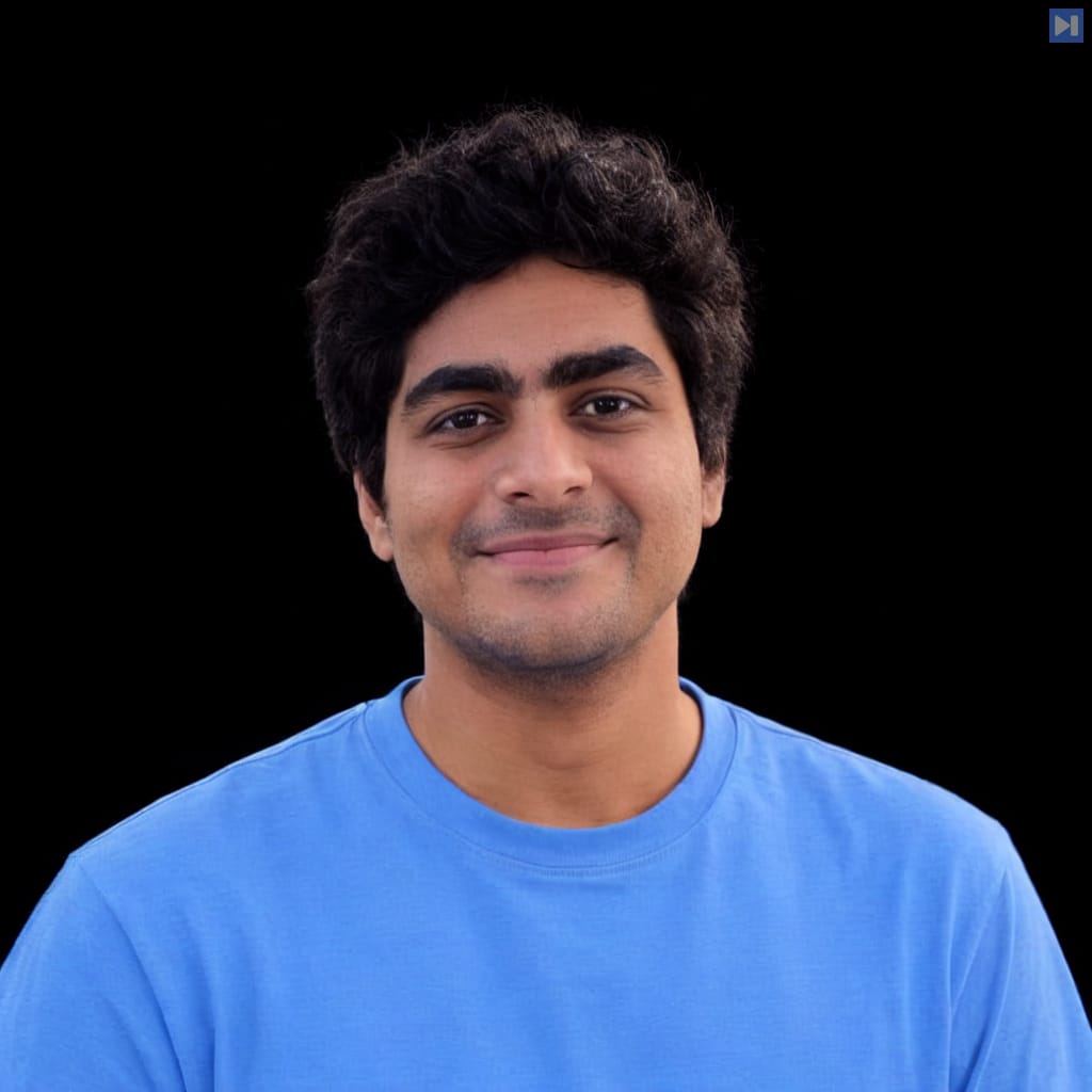 Head-and-shoulders portrait of Yash Patil against a black background.