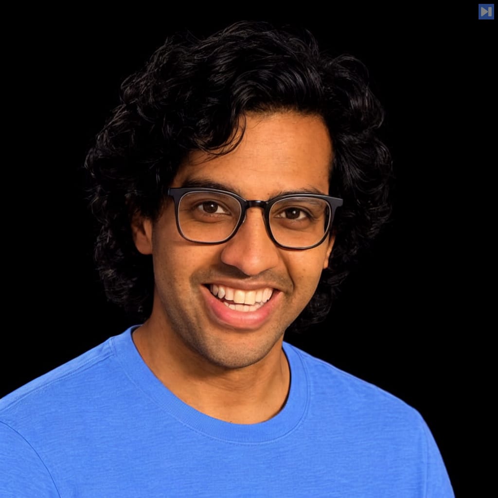 Head-and-shoulders portrait of Zubin Aysola against a black background.
