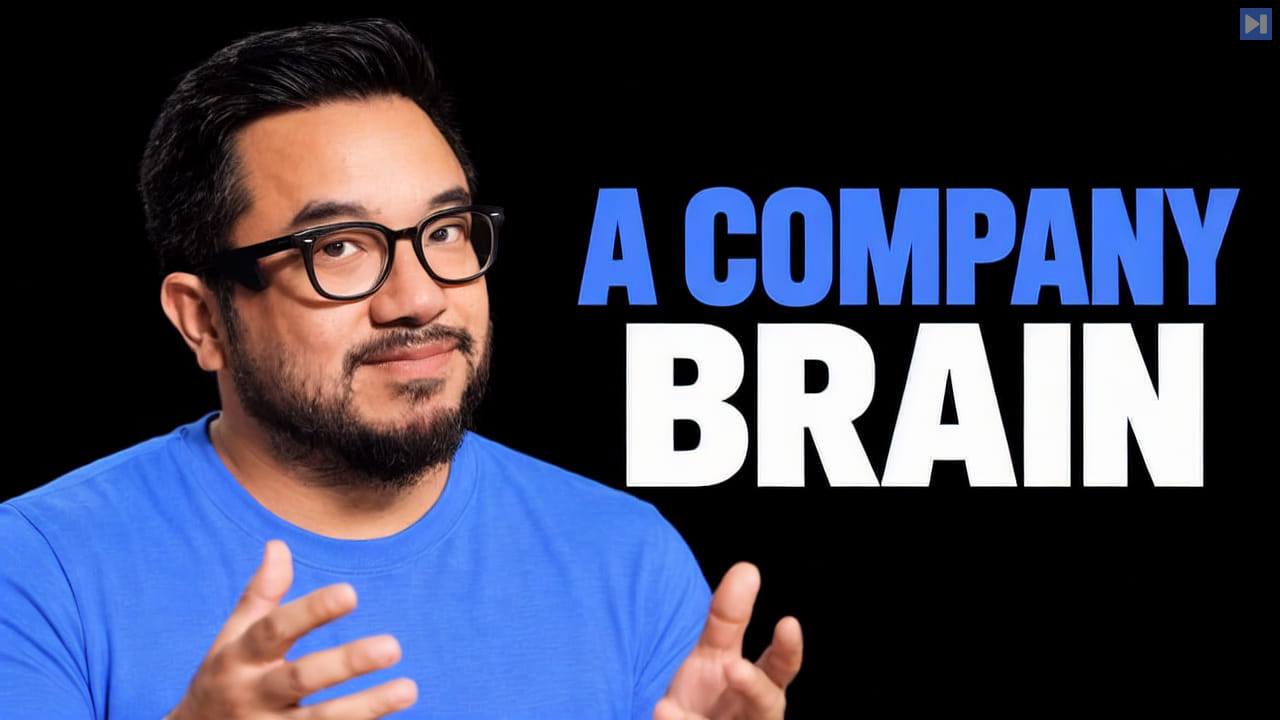 Garry Tan against a black background with the blue and white headline “A COMPANY BRAIN”.