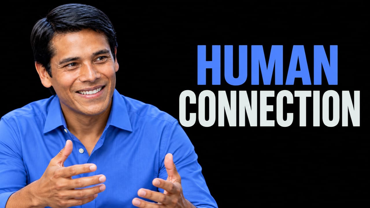 Nirav Tolia gestures beside the blue and off-white HUMAN CONNECTION headline on black.