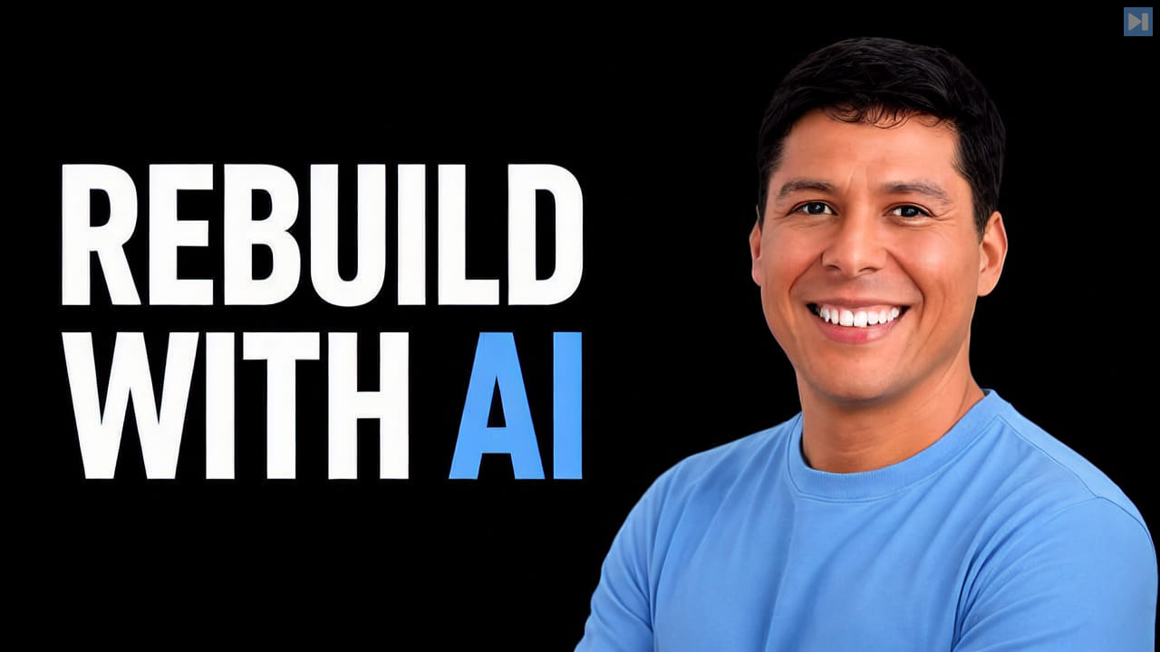 A smiling dark-haired man in a blue T-shirt beside REBUILD WITH AI in white and blue on black.