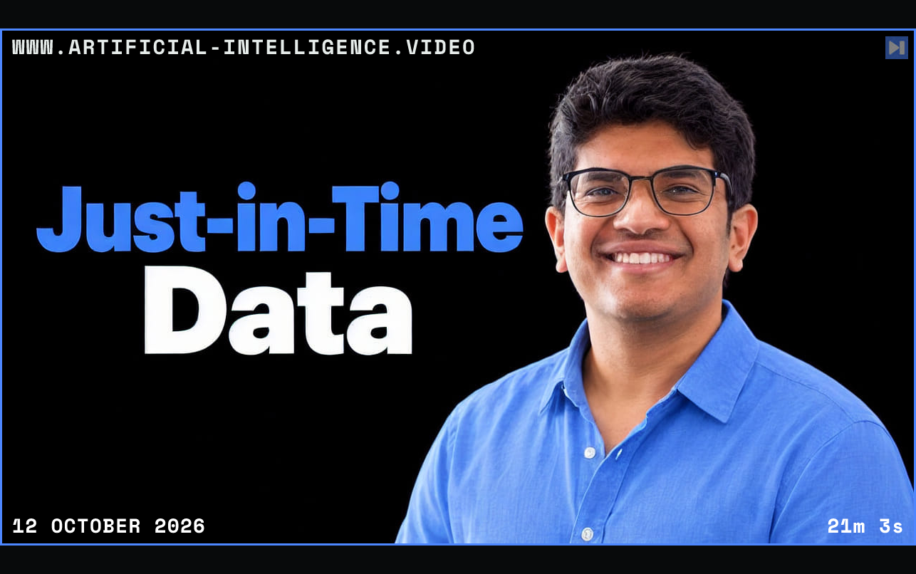 Hrishi Olickel in a blue shirt and glasses against black beside the blue-and-white headline “Just-in-Time Data”. Framed in blue with WWW.ARTIFICIAL-INTELLIGENCE.VIDEO, 12 October 2026 and duration 21m 3s.